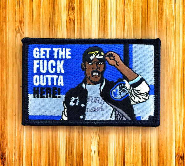 Embroidered patch depicting a man holding sunglasses above his head with text that reads Get the fuck outta here