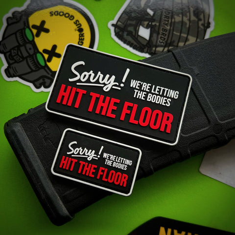Dangerous Goods® Sorry We’re Letting The Bodies Hit The Floor Sign Patch - 2 Size Options