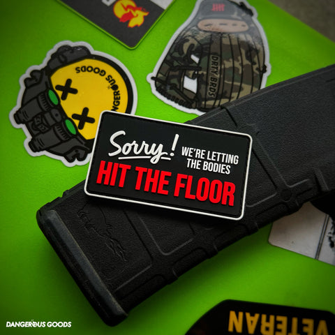 Dangerous Goods® Sorry We’re Letting The Bodies Hit The Floor Sign Patch - 3” Edition