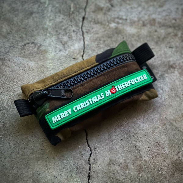 Green Rubber Patch with white text that reads merry christmas motherfucker in white font color