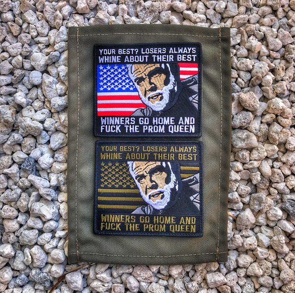Two Embroidered patches with a man’s head in the middle and text above and below that reads Losers always whine about their best winners go home and fuck the prom queen