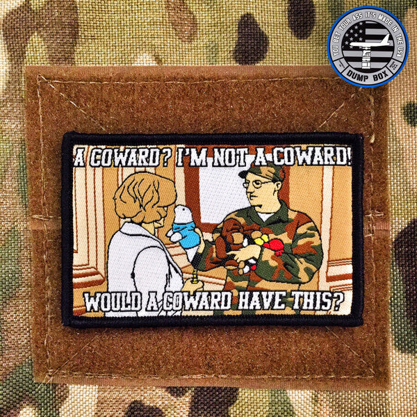 Embroidered patch depicting A man and a woman facing each other with text that reads I’m not a coward would a coward have this