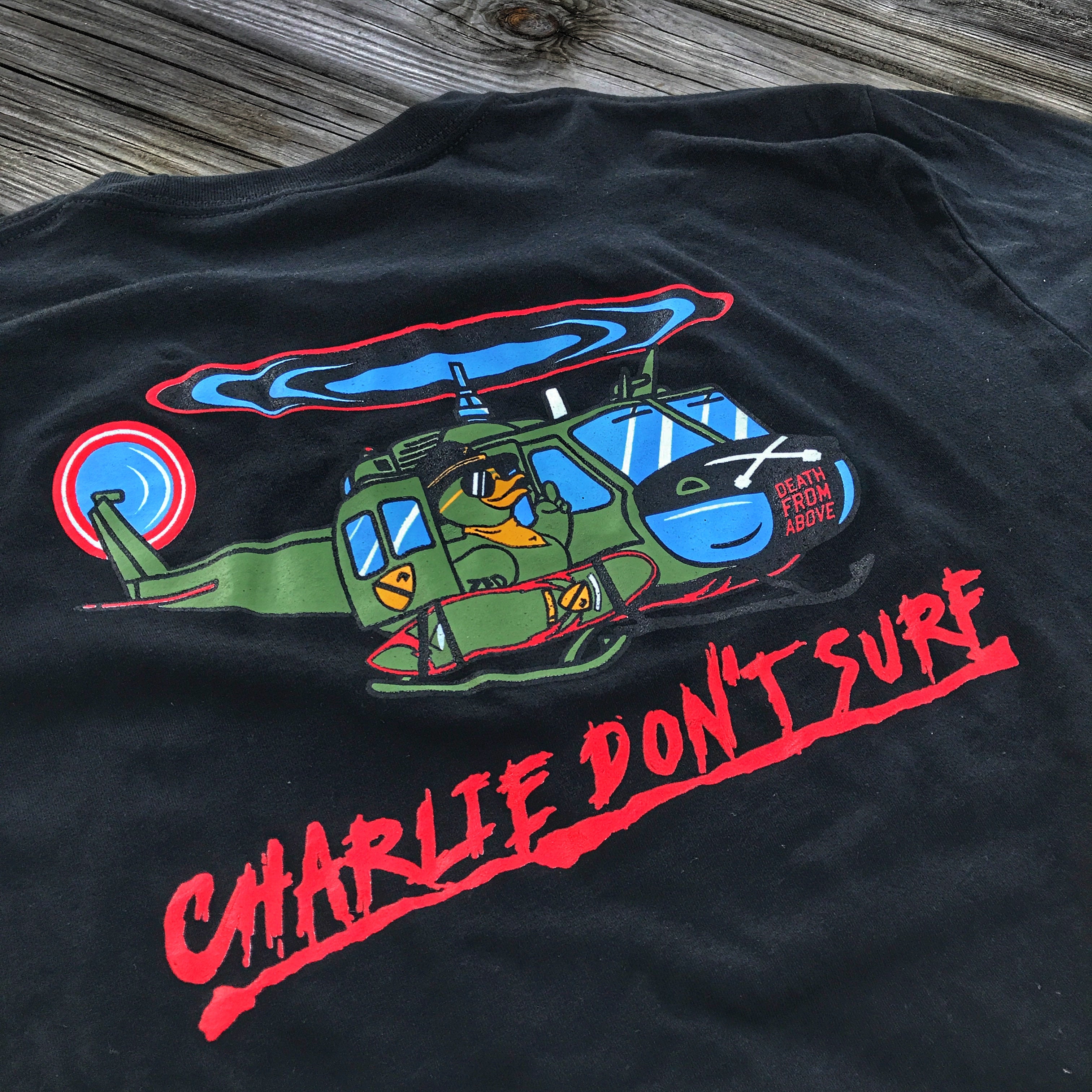 ZERO FUCKS DUCK KILGORE HUEY 'CHARLIE DON'T SURF' T-SHIRT - BLACK