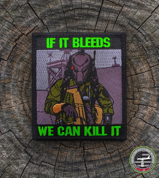 Embroidered patch depicting A man wearing a mask while holding a gun with text that reads If it bleeds we can kill it